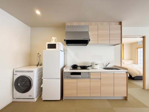 b hotel WAKO Ekimae BLD - Zen Stay Spacious Apartment