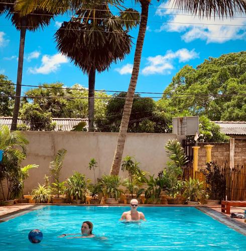 people in the swimming pool at a resort at Laughing Leopard Trinco in Trincomalee