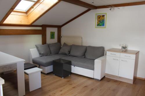 a living room with a couch and a table at Gästehaus Hanser in Virgen