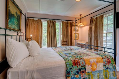 a bedroom with a large bed and a window at Vintage Rockport Escape in Rockport