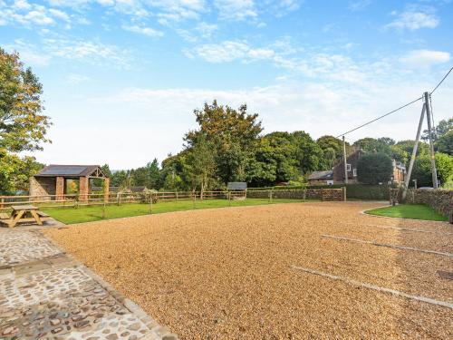 a basketball court in a park with a fence at Shepherds Barn in Bollington