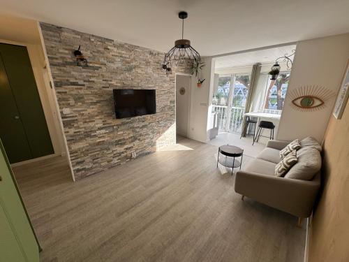 Studio cosy 30 m2 climatisé au centre ville de LGM