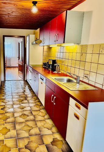 a kitchen with a sink and a counter top at Ferienwohnung Bayerischer Wald in Zwiesel