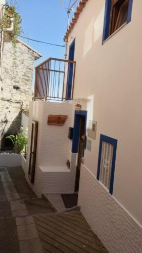 a stairway leading up to a white building at SERENA Apartamento Cudillero in Cudillero