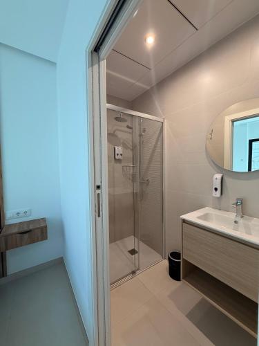 a bathroom with a shower and a sink at Quercus in Pozoblanco