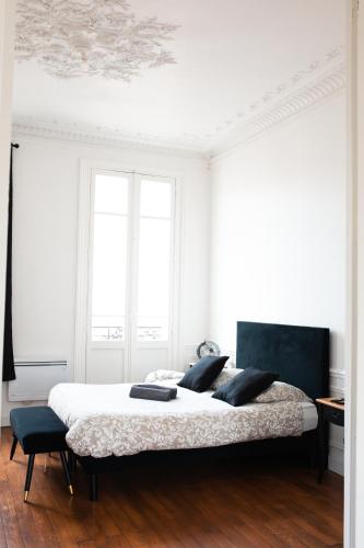 Maison Belle Époque - Immeuble haussmannien spacieux et élégant