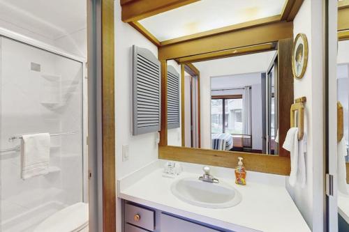 a bathroom with a sink and a mirror at Snowcreek 1520 in Sun Valley