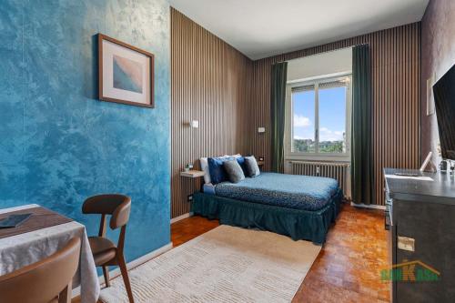 a hotel room with a bed and a window at MILANO Bicocca Niguarda a 15min dal DUOMO in Milan