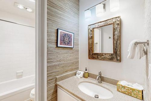 a bathroom with a sink and a mirror at Valley Gem Lower in Sun Valley