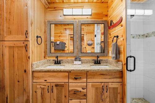 a bathroom with a sink and a mirror at Beside Still Water 2 in Cosby