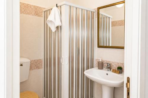 a bathroom with a sink and a shower at Il Castello di Atessa in Atessa