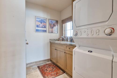 a kitchen with a white stove and a sink at Serenity in the Valley in Jackson