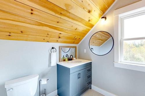 a bathroom with a sink and a mirror at Ridgeview in Whitefield