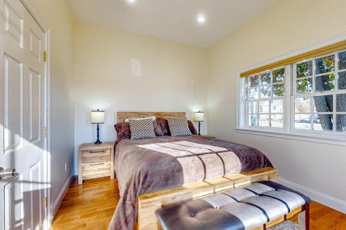 a bedroom with a bed and a window at Bianca in Gloucester