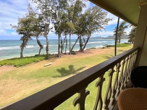 a balcony with a view of the ocean at Oceanfront Studio at Islander on the Beach #325 in Kapaa