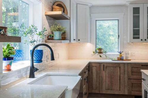 a kitchen with a sink and a window at Tideview Estate in Cumberland Foreside