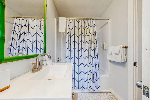 a bathroom with a sink and a shower at Topside Garden in North Conway