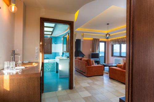 Et badeværelse på Cavo Seaside Suites