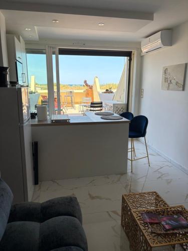 Village naturiste - Heliopolis AB 30m2 - vue mer avec grande terrasse - Parking