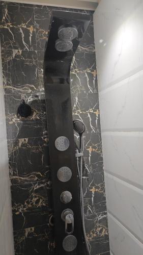 a skateboard on the floor in a room at Meenaji's home in Mumbai