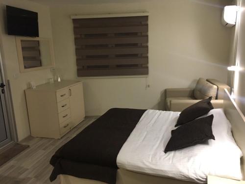 Postel nebo postele na pokoji v ubytování Hotel Restoran EPI