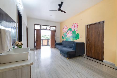 a large living room with a couch and a sink at Sunset view Villa 966o9o1oo6 Luxury 5BHK Villa with pool in Nathdwara 2km from temple only By SK in Nāthdwāra