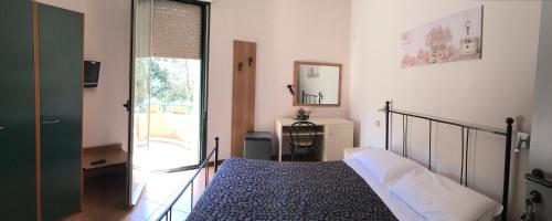 Hotel Stazioneにあるベッド