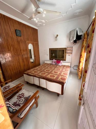 a bedroom with a large bed in a room at Subhash Chander homestay in Panchkula