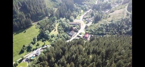 an aerial view of a road in the middle of a mountain at hotel spiegeltaler eck in Wildemann