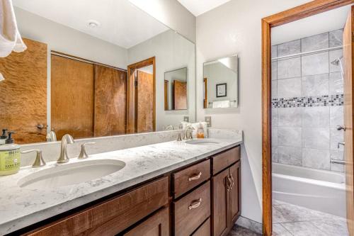 a bathroom with a sink and a shower at Railbender 8 in Fraser