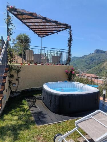 a swimming pool in the backyard of a house at La Cornice dei Monti in Tramonti