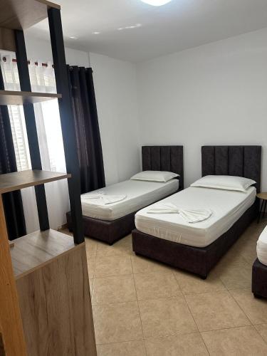 three beds in a room with at Villa Del Sol in Golem