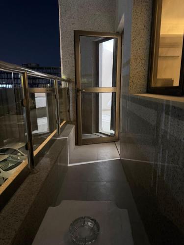 a view of a balcony of a building with a window at Studio in South Khobar in Al Khobar