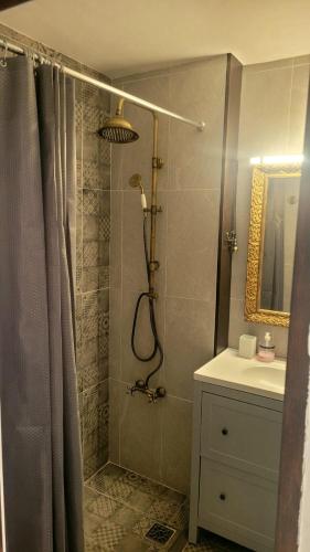 a bathroom with a shower and a sink at Apartments in Alicante