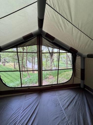 a view of a window in a tent at Sanovia Glamping Max in Reczpol