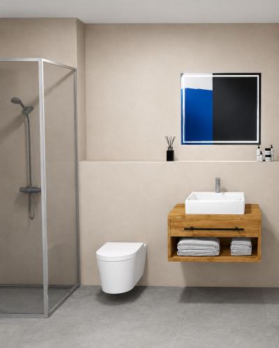 a bathroom with a toilet and a sink and a tv at Wolf Apartments in Ladis