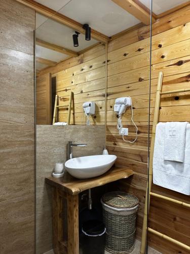 a bathroom with a sink and a mirror at Meris in Ulcinj