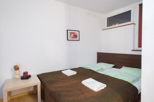 Posteľ alebo postele v izbe v ubytovaní ShortStayPoland Graniczna (B6)