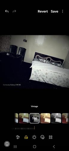 a picture of a bedroom with a bed in a room at Hotel New Green View a part in Srinagar