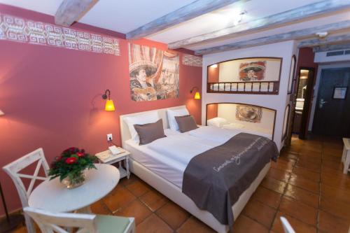 4-Sterne Erlebnishotel El Andaluz, Europa-Park Freizeitpark & Erlebnis-Resort 객실 침대