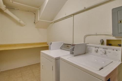 a white laundry room with a washer and dryer at Autumn Foliage 209 in Breckenridge