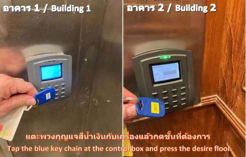a picture of a pay phone being inserted into a wall at Lee Place Phatthanakan Condo in Bangkok
