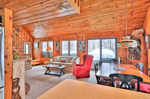 a living room with a kitchen and a dining room at 278 Ghia Farm Road in Ludlow