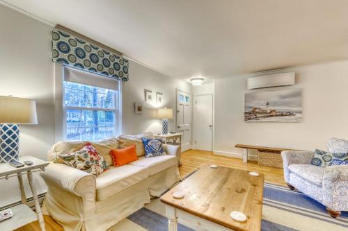 a living room with a couch and a table at Kennebunk Family Cottage in Kennebunk