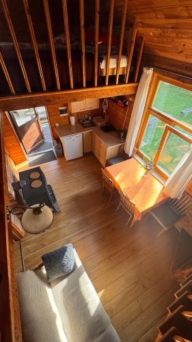 an overhead view of a living room in a cabin at Viesu māja "Ozoliņi" in Jūrkalne