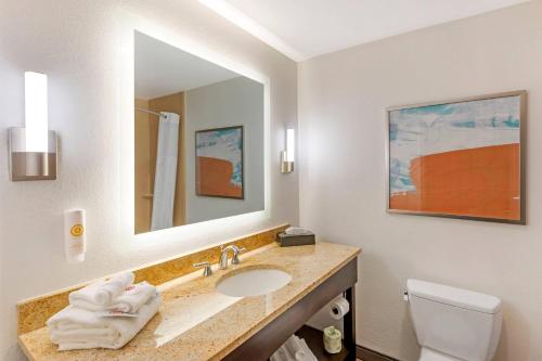 a bathroom with a sink and a mirror at Comfort Inn & Suites Verona at Turning Stone Resort Casino in Verona