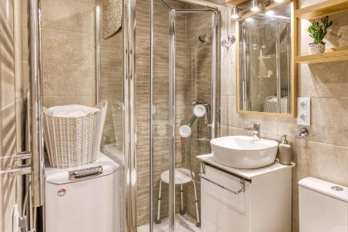 a bathroom with a shower and a sink at La Pau de Portbou 2 in Portbou