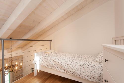 a bedroom with a bed in a attic at Apartment Amare in Rovinj