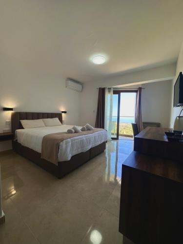 Llit o llits en una habitació de Palates Hotel