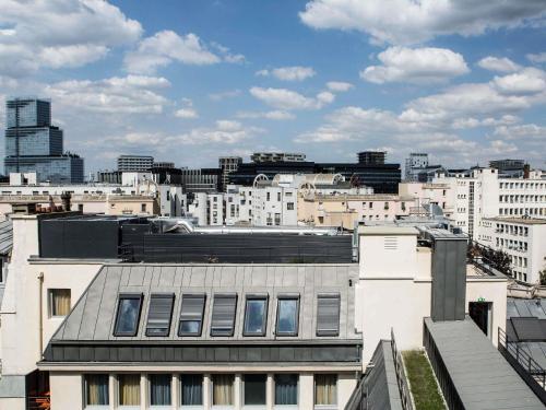a view of a city skyline with buildings at Mercure Paris 17 Batignolles in Paris